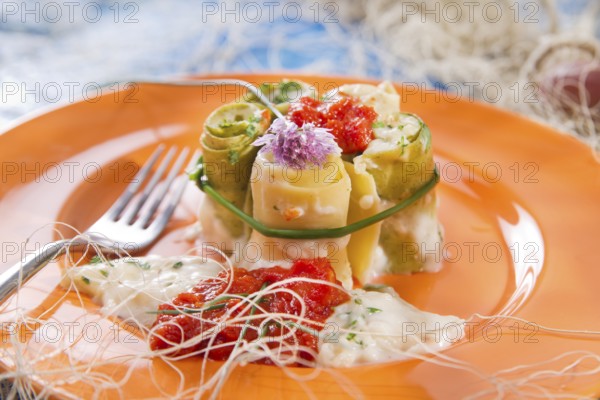 Presentation of a plate of rolls with crab meat