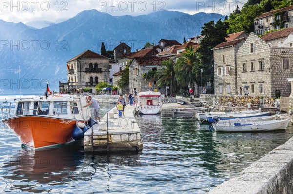 PERAST, MONTENEGRO, JUNE 18: View on embankment and boats in old town on June 18, 2014 in Perast, Montenegro
