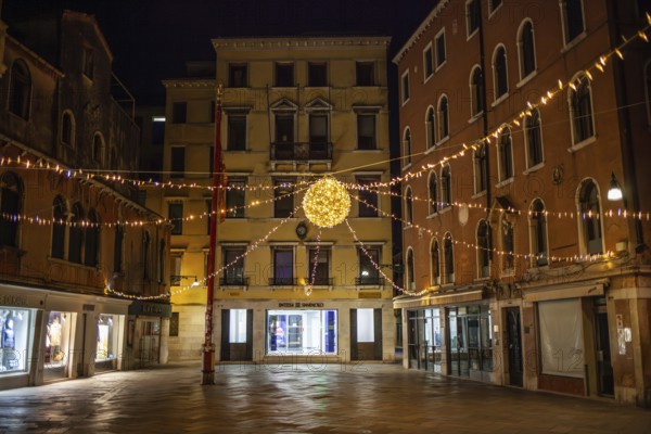 Light decoration on a square in the old town centre, night shot, Venice, Italy