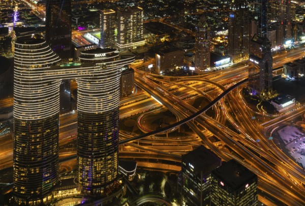 A picture of the Address Sky View Hotel and the busy Al Safa Street and Sheikh Zayed road intersection at night