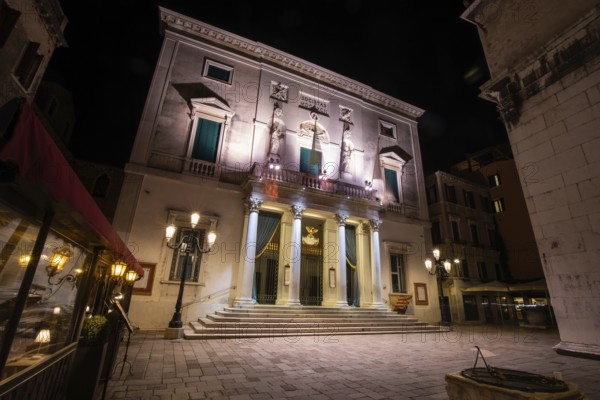 Entrance area, facade of the opera house Teatro la Fenice, night shot, Venice, Veneto, Northern Italy, Italy
