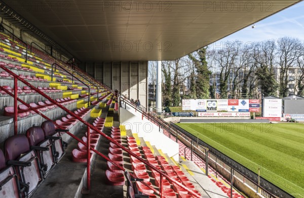 Belgium, 02 16 2019: Colorful seats on the tribunes of the Racing White Daring Molenbeek football stadium