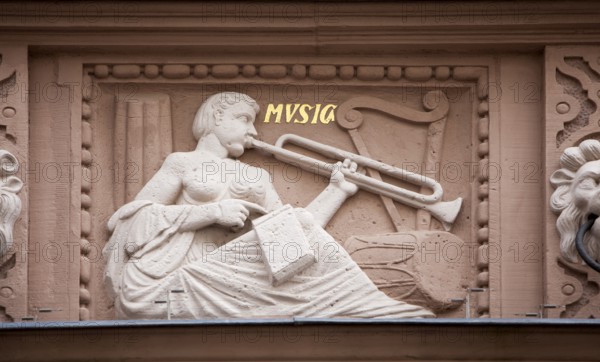 Trombone player, decoration of the facade, Town Hall, Lemgo, North Rhine-Westphalia, Germany