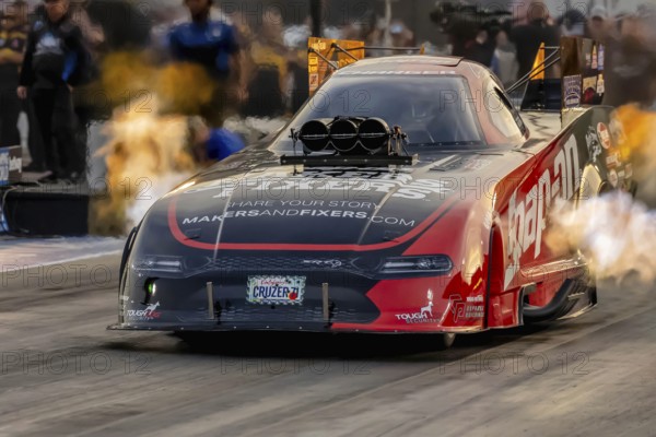 Sep 22, 2023-Concord, NC: NHRA Funny Car Series driver, Cruz Pedregon, runs down the lane during a qualifying session for the Betway Carolina Nationals