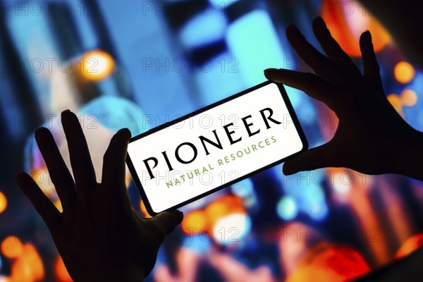 In this photo illustration, the Pioneer Natural Resources Company logo is seen displayed on a smartphone
