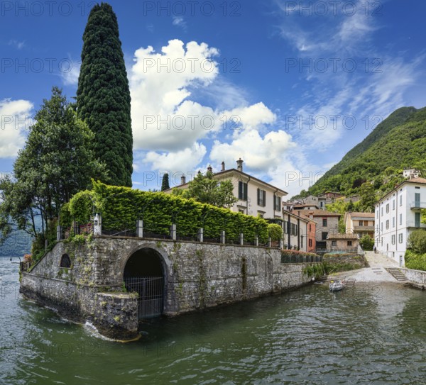 A view of a villa on Lake Como by an American actor in summer in Italy