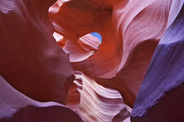 Graceful arches and a piece of blue sky in a magical canyon Antelope. Navajo Reservation, the United States