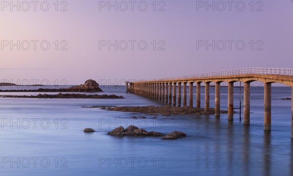 Bridge to Ferry to Ile de Batz, Roscoff, Brittany.This bridge is used during the low tide.The bridge is 600 meters long