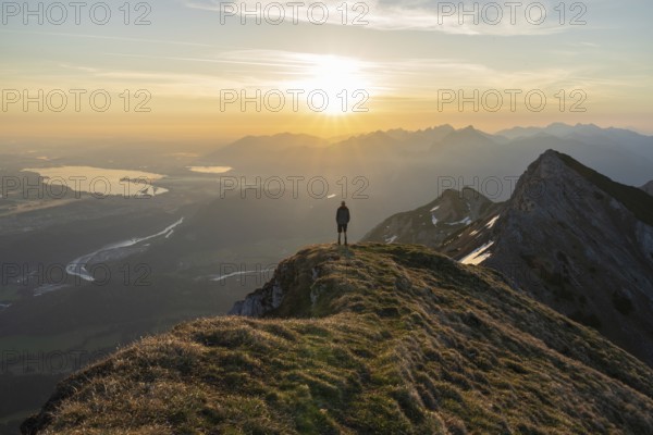 Mountain peak Große Schlicke at sunrise, town of Füssen in the valley