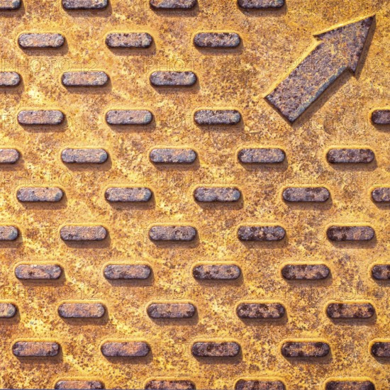 Steel rusty texture from Manhole cover. Orange metallic background