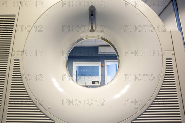 Magnetic resonance imaging (MRI) scan in a new neurosurgery clinic in a modern hospital specialized in treatment of cerebrovascular diseases. From behind