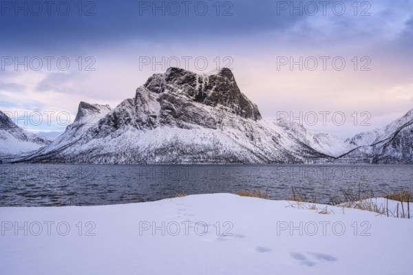 Beautiful winter landscape scene, sunset or sunrise in mountains and fjords