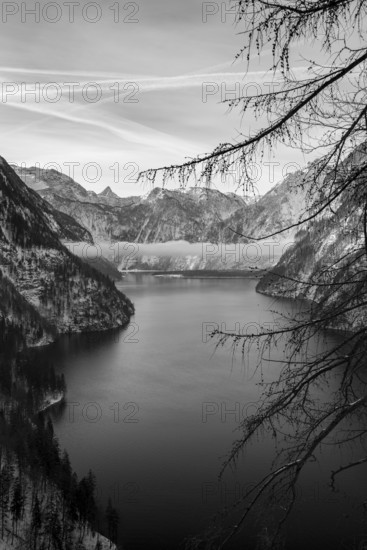 Lake Plansee near Reutte Tyrol in black and white with clouds in the valley