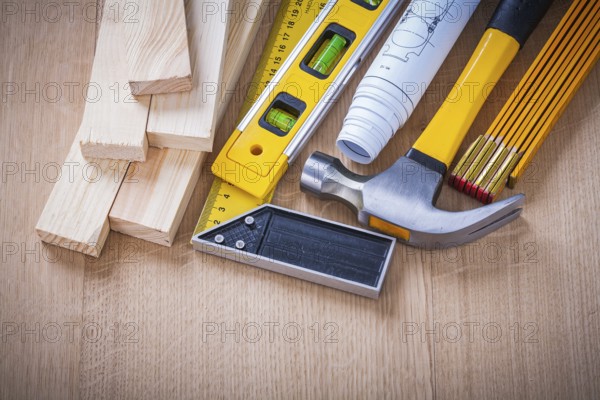 Group of house-improvement working tools on wooden board building and architecture concept