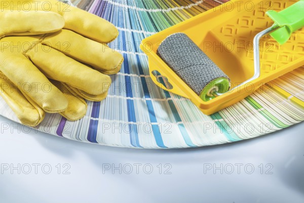 Paint roller tray safety gloves pantone fan on white background