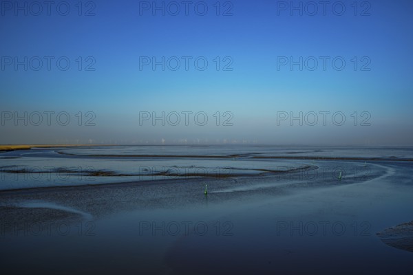 Tranquil waterscape with minimalist horizon under a blue sky, 9688 TN Drieborg, Dollart, Netherlands