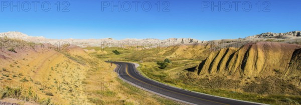 Fascinating colorful hills along the road leading through Badlands National Park, USA