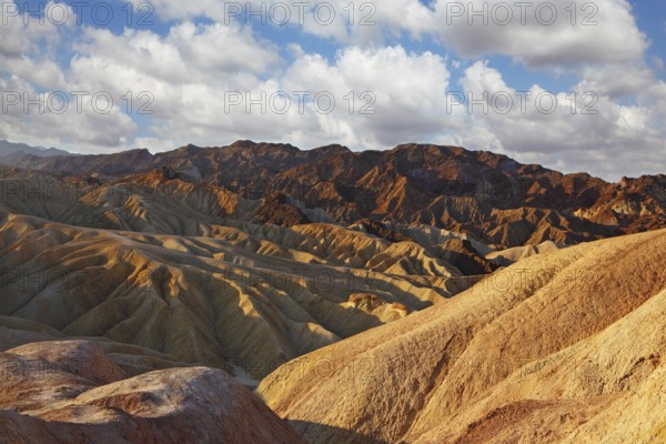 The famous section of Death Valley in California - Zabriskie Point. Magically beautiful sunset