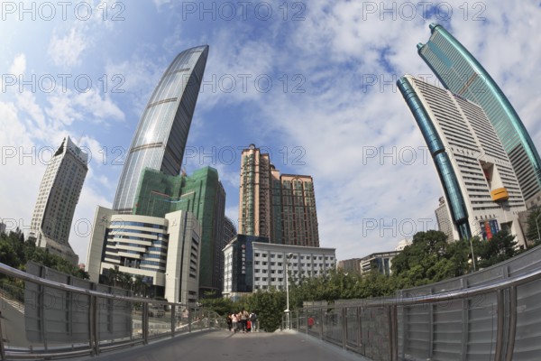 SHENZHEN - CITY IN SOUTH OF PEOPLE'S REPUBLIC OF CHINA - NOVEMBER 19, 2011: The magnificent modern city with wide prospectuses and skyscrapers.Pedestrian bridge in the city center
