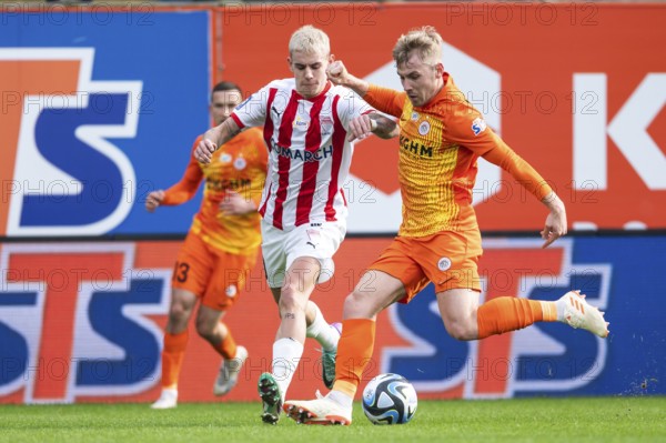 LUBIN, POLAND - FEBRUARY 18, 2024: Football match Polish PKO Ekstraklasa between KGHM Zaglebie Lubin vs Cracovia 1:1. In action Karol Knap (L) and Tomasz Makowski (R)