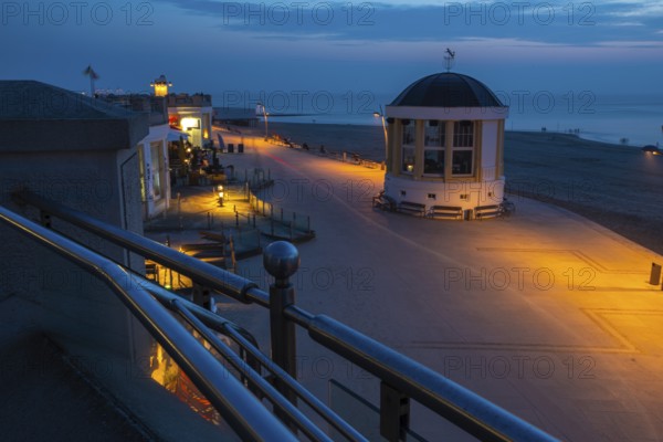 Seaside walk in Borkum town at night with Music Pavilion and lights. Seaside walk in Borkum town at night with Music Pavilion