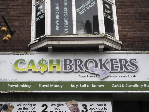Chester. Cheshire, United Kingdom, 20 March 2024 : Sign above a cashbrokers pawn brokers and exchange in Chester
