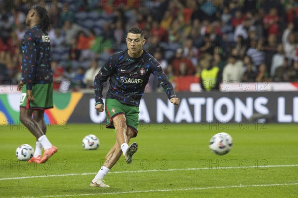 Football match, Cristiano RONALDO CR7 Portugal warming up in front of the match with left foot shot and closed eyes, Estadio do Dragao, Porto, Portugal