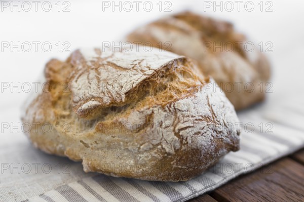 Extreme clos-up of rustic Italian bread, isolated on background out of focus