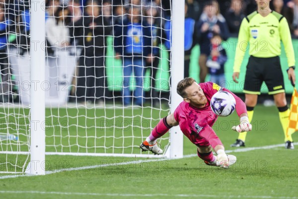 MELBOURNE, AUSTRALIA, MAY 22: Mark Gillespie Newcastle United saves a penalty against Tottenham Hotspur during the Global Football Week at The Melbourne Cricket Ground on May 22, 2024 in Melbourne, Australia