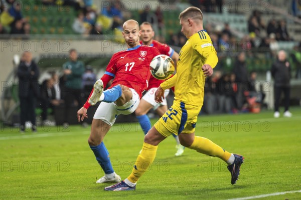 WROCLAW, POLAND - OCTOBER 14, 2024: UEFA Nations League match Ukraine - Czechia. In action Vaclav Cerny (L) and Mykola Matviyenko (R).