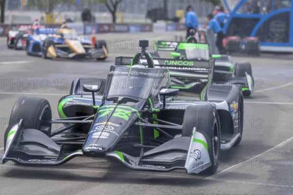 INDYCAR Series driver, AGUSTIN HUGO CANAPINO (R) (78) of Arrecifes, Argentina, travels through the turns during a practice session for the Big Machine Music City Grand Prix at Streets of Nashville in Nashville TN