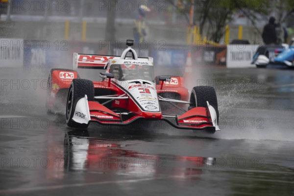 INDYCAR Series driver, SCOTT MCLAUGHLIN (3) of Christchurch, New Zealand, travels through the turns during a wet and dangerous practice session for the Big Machine Music City Grand Prix at Streets of Nashville in Nashville TN