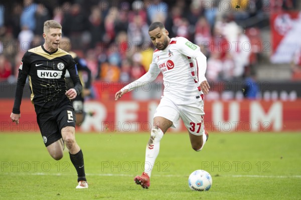 (DFL/DFB REGULATES PROHIBIT ANY USE OF PHOTOGRAPHS AS IMAGE SEQUENCES AND/OR QUASI-VIDEO), RheinEnergieStadion, Cologne, North Rhine-Westphalia, Elias Baum (SV 07 Elversberg, defence, #2), Linton Maina (1.FC Köln, midfield, #37), 2nd Bundesliga, 1.FC Köln, SV 07 Elversberg on 25.01.2025 at RheinEnergieStadion in Cologne Germany