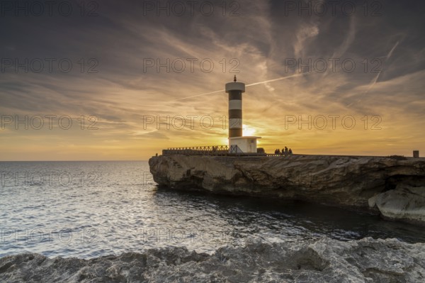 A view of the lighthouse at Colonia Sant Jordi in Mallorca at sunset