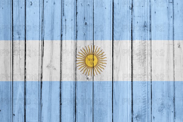 The Argentine flag painted on a wooden fence