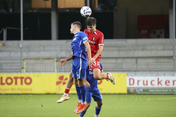 Header duel against Rico Wehrle (Bahlinger SC /BSC) and Karl Steinmann (SC Freiburg II / U23) during the match of the Soccer-RL SW 24-25: 9. Sptg: SC Freiburg II vs Bahlinger SC, Freiburg im Breisgau, Germany / Germany
