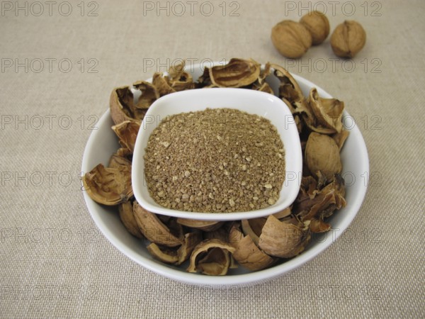 Brown granules of walnut shells, ground nutshells