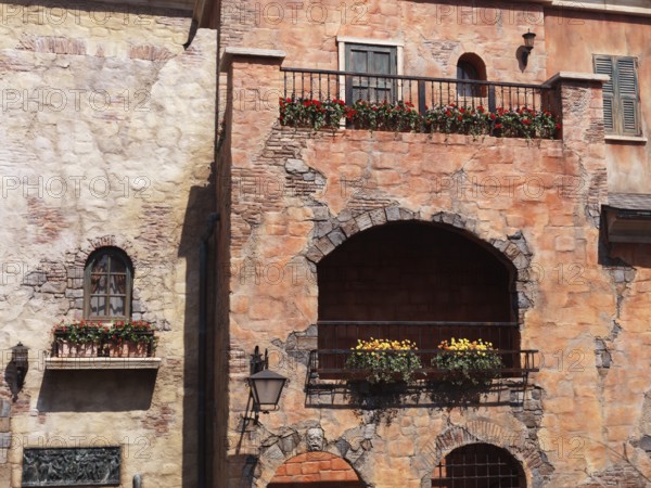 Antique Italian architecture details, old house balconies and windows with flowers