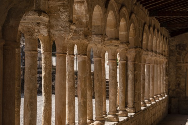 Arcaded gallery of semicircular arches on paired columns, Church of the Savior, 13th century rural Romanesque, Carabias, Guadalajara, Spain