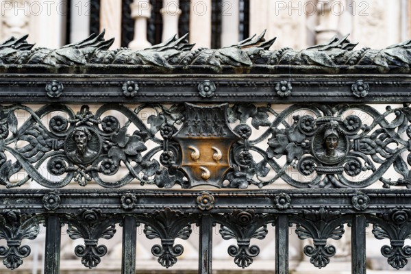 Forged metal fence near the Duomo Cathedral. Milan, Italy.