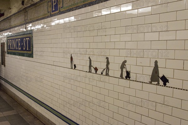 Art at the wall of subway station Prince Street in New York, USA