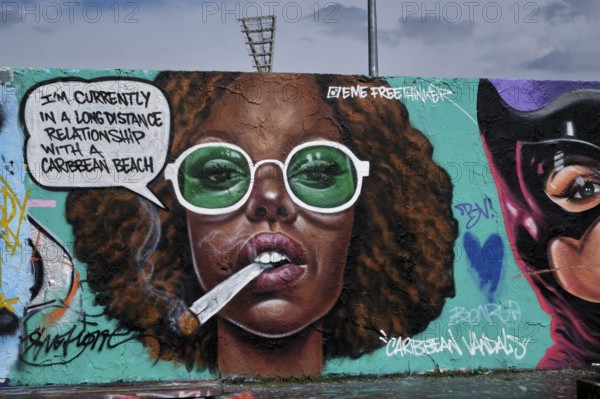 Germany, Berlin, 04.08.2024, Sunday afternoon in Mauerpark, Graffiti wall, work by Eme Freethinker, Caribbean Vandals, Im Currently in a long distance relationship with a Caribbean beach