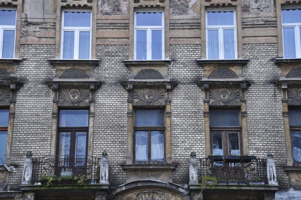 Weathered Art Nouveau façade in Krakow