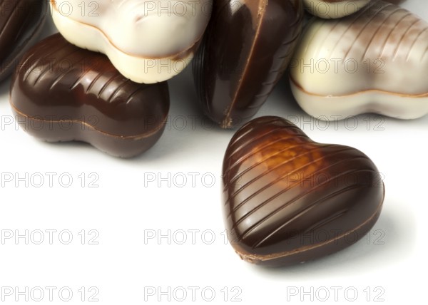 Chocolates in the shape of hearts white isolated