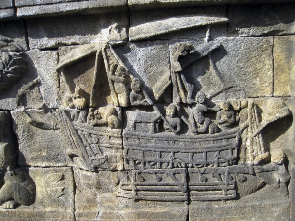A Borobudur ship is the 8th-century wooden double outrigger, sailed vessel of Maritime Southeast Asia depicted in some bas reliefs of the Borobudur Buddhist monument in Central Java, Indonesia.<br/><br/> The ships depicted at Borobudur were most likely the type of vessels used for inter-insular trades and naval campaigns by the Sailendran and Srivijayan thalassocracy empire that ruled the region around the 7th to the 13th century.<br/><br/> The function of the outrigger was to stabilize the ship, a single or double outrigger canoe is the typical feature of the seafaring Austronesian vessels. It is considered by scholars to have been the most likely type of vessel used for their voyages and exploration across Southeast Asia, Oceania, and the Indian Ocean