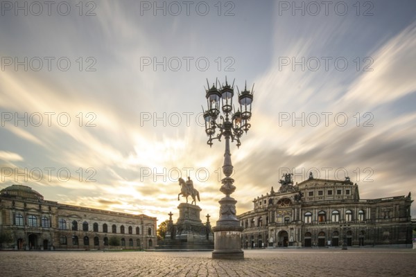 The Semperoper, Saxony's royal court and state opera house. The opera house is located on Theaterplatz in the historic city centre. Sunset at the architectural baroque building. Dresden, Saxony, Germany