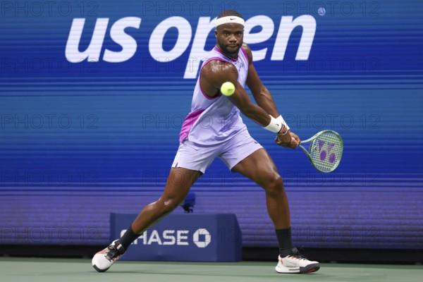Tennis player Frances Tiafoe in action at the US Open 2024 Championships, Billie Jean King Tennis Center, Queens, New York, USA
