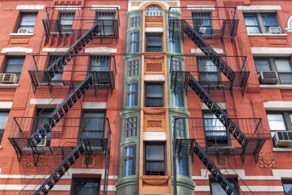 The typical old houses with fire stairs in New York in USA