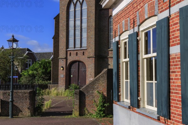 Old church with magnificent brick façade in the centre of the village, bredevoort, gelderland, the netherlands