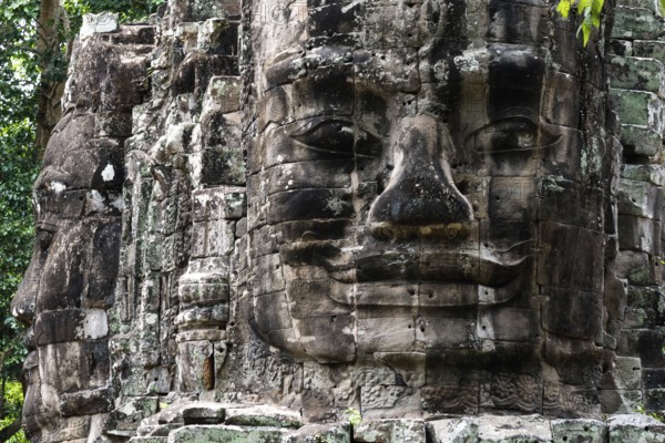 Buddhist gatekeepers, mystical, enchanted, close-ups, Khmer Kingdom, Theravada Buddhism, Unesco World Heritage Site, sacred statues, Angkor Thom, Angkor Wat, Siem Reap, Cambodia, Southeast Asia